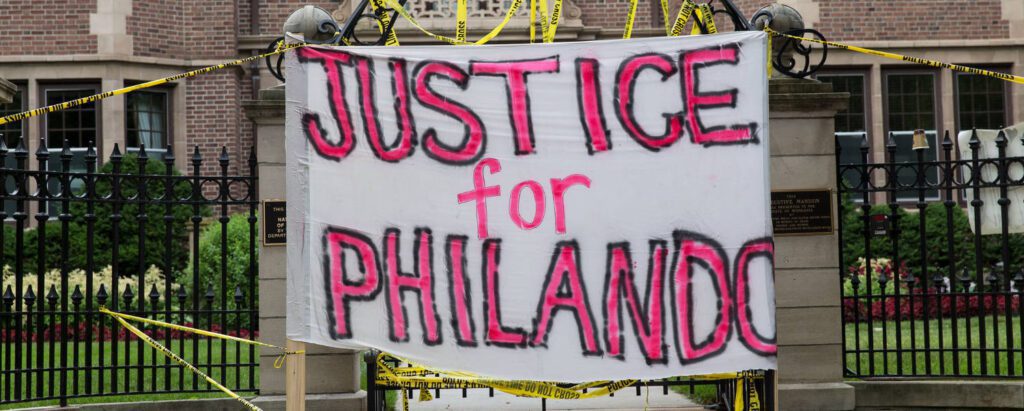'Justice for Philando' - a banner from a rally outside the Minnesota Governor's Mansion. Alton Sterling and Philando Castile. Credit Lorie Shaull.